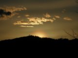 Pollen Corona and Iridescent Cloud at Sunset