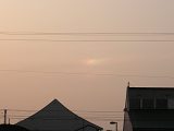 Parhelion in the Reddish Sky