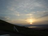 Faint Parhelion and Sun Pillar