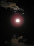 Iridescent Cloud by the Moon