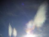Iridescent Cloud (and 22-degree Halo)