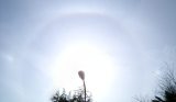 Upper Tangent Arc, Pahelia, and 22-degree Halo