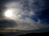 Faint Parhelion and 22-degree Halo