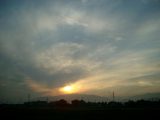 Parhelion, 22-degree Halo, and Crepuscular Rays