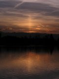 Sun Pillar and Its Reflection on the Water
