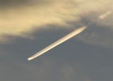 Iridescent Contrail and Cloud