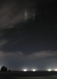 Light Pillars by Fishing Boats