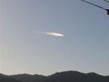 Parhelion on a Vapor Trail