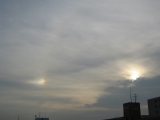 Left Parhelion and Faint 22-degree Halo